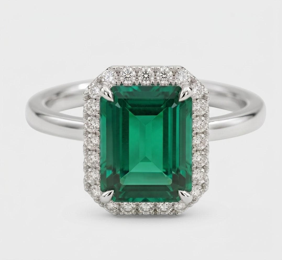 Anillo halo de esmeralda, oro blanco